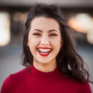 Smiling girl with red top